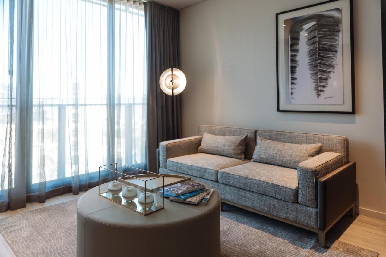 One Global Resorts Green Square Sydney Exterior foto A living room at The Ritz-Carlton, DIFC