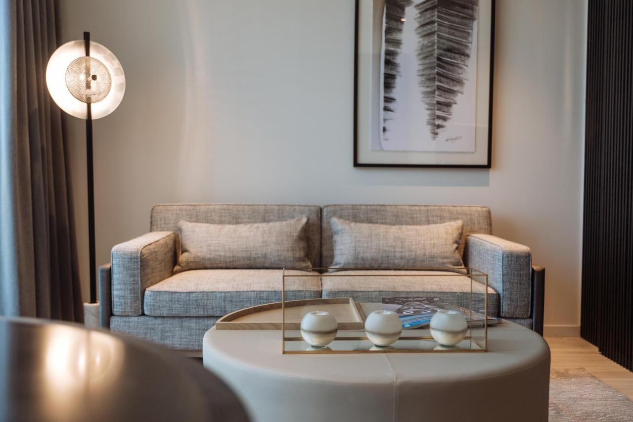 One Global Resorts Green Square Sydney Exterior foto A living room at the Ritz-Carlton, DIFC